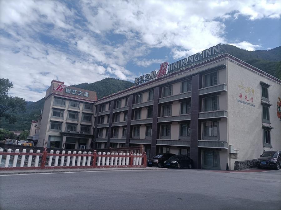 九寨沟县漳扎镇漳扎村三组1、2 幢的宾馆房地产